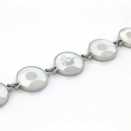 


Silver bracelet with circular links on a white background