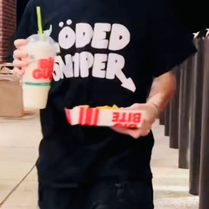 Guy holding big gulp with the Löded 5n1per graphic on a black Fiftyonebrand tee